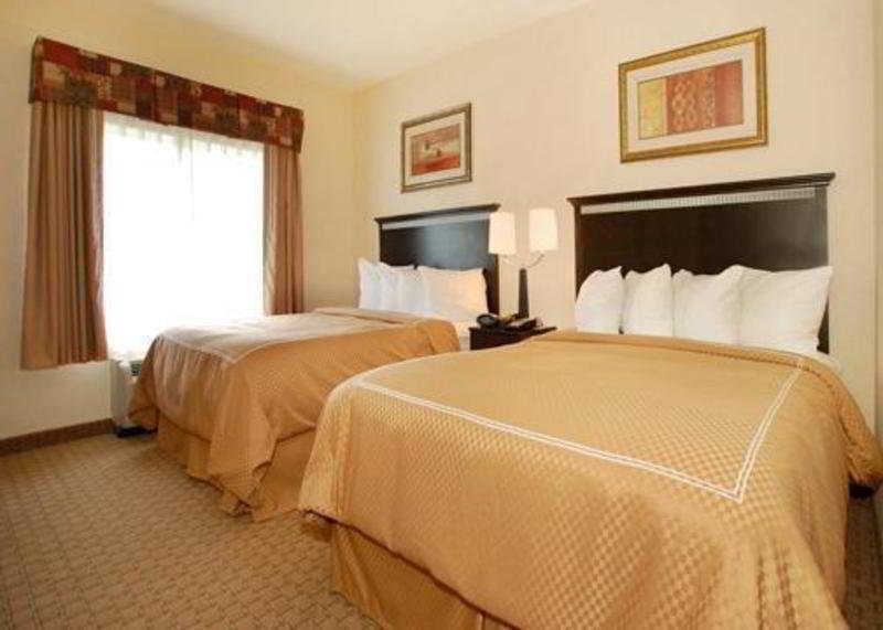 Comfort Suites Southport Rum bild